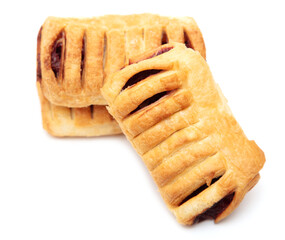 Puff pastries with jam isolated on a white background.