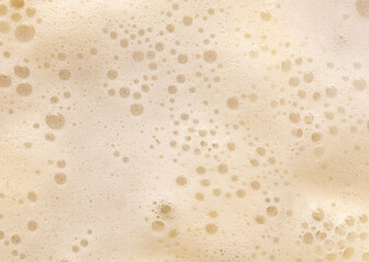 White foam in boiling water as an abstract background.