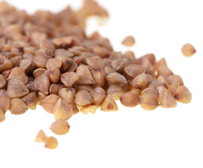 Buckwheat groats isolated on white background.