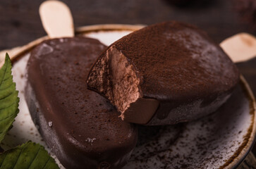 Composition with chocolate chestnut  ice cream on a stick