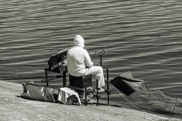 A man fishing with a rod