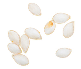 Close-up of pumpkin seeds on a white background. Macro