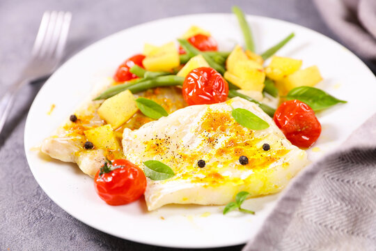 fih fillet with potato and tomato