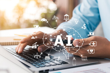 businessman working on laptop computer and smartphone for artificial intelligence polygon brain...