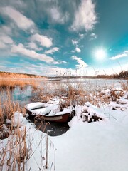 boat in the snow. Lake Mosąg. 