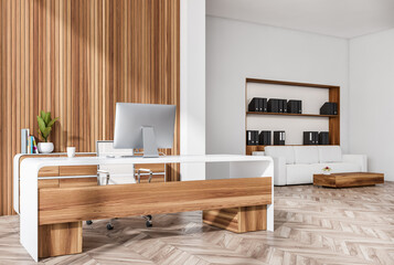Stylish office interior with wooden panels, CEO workplace, Lounge area on background with couch and bookshelves with folders. Hearing bone hardwood floor. 3d rendering