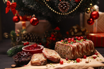 Traditional French terrine covered with bacon and decorated Christmas tree
