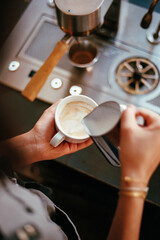 Barista making a cappuccino