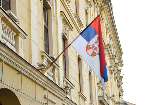 Serbia National Flag (Serbian flag) on the building.