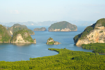 Landscape nature of Samet Nangshe Viewpoint is the fantastic limestone formations on the bay  with green mangrove forest panoramic viewpoint in Phang Nga Bay in sunny day locate at Phang Nga Thailand