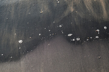 Black sand beach at Nang Thong Beach at Khao Lak Phang nga Thailand - Black nature abstract...