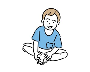 あぐらをかいて座る男の子