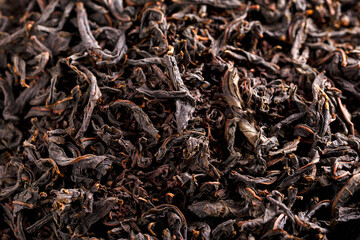 Dry Black large leaf tea. Background, texture