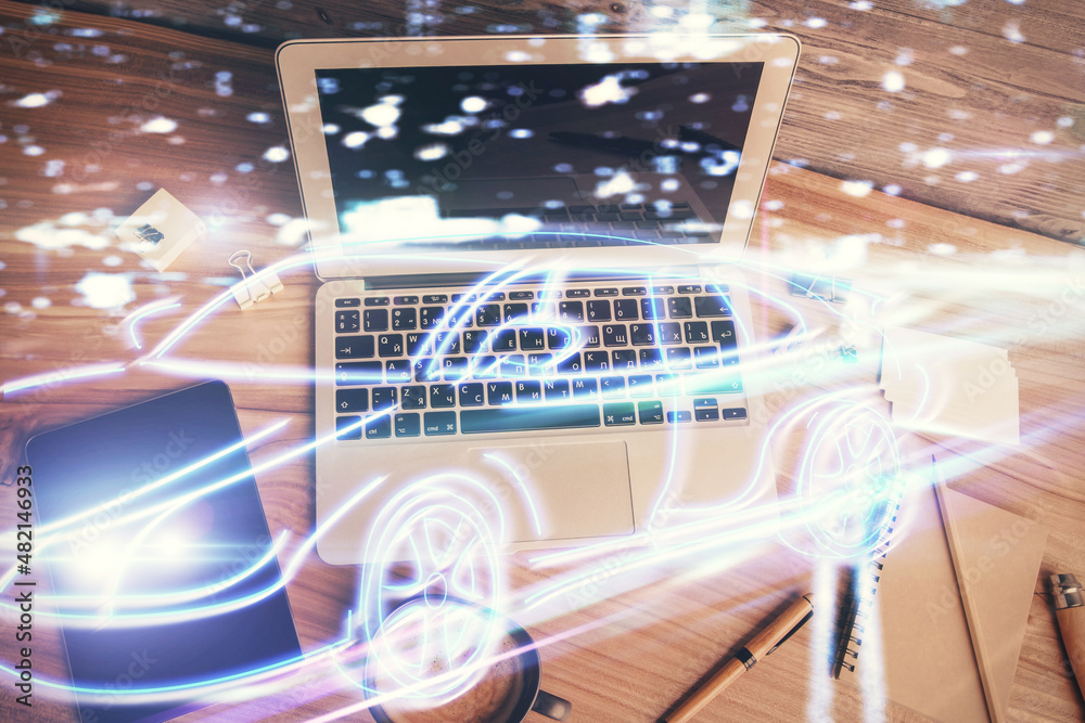 Aufkleber Auto pilot hologram drawing over computer on the desktop background. Top view. Double exposure. Tech concept.