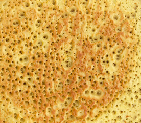 Textured background of delicious fried pancake