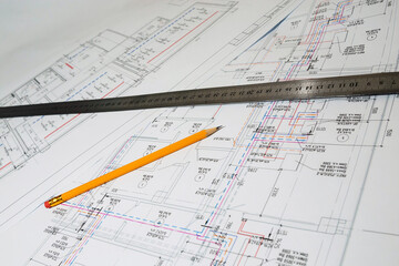 Engineering drawings in close-up. Engineering drawings with a ruler and pencils.