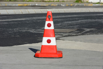 Collar cone, no parking mark on the street.