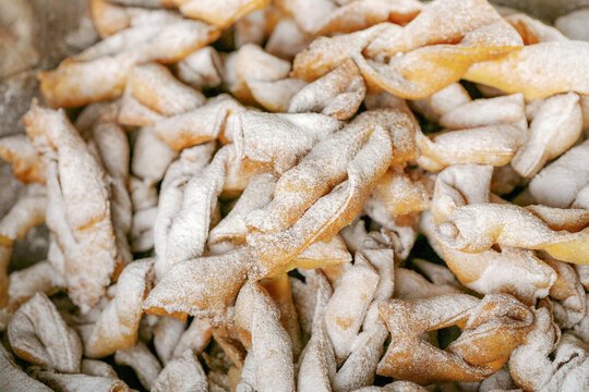Angel wings called in Poland faworki or chrust  cakes deep fried in oil to celebrate Fat Thursday. A traditional Polish delicacy before Lent.