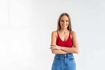 Portrait of a smiling woman posing isolated on a white background