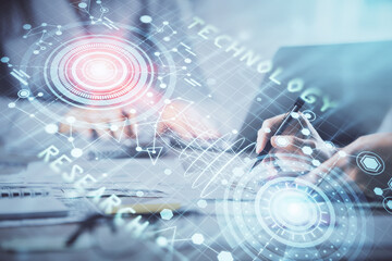 Double exposure of woman hands working on computer and data theme hologram drawing. Tech concept.