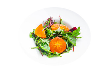 persimmon salad lettuce green leaves mix healthy meal food snack on the table copy space food background vegan or vegetarian food