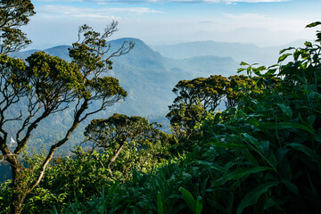 Valley view with villages and mountains at sunrise. View from Adam's peak, Sri Lanka