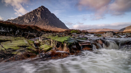 Glencoe river and mountain from a rarely used location. fast flowing water and drama in this...