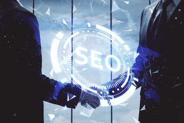 Double exposure of SEO hologram and handshake of two men. Search optimization concept.
