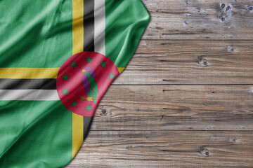 Wooden pattern old nature table board with Dominica flag - 482154170