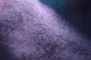 shadow cast on faux fur fabric 
