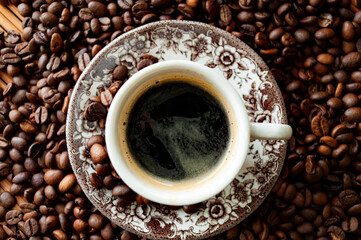 cup of coffee with beans