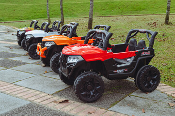 View of 4x4 atv toy in a row at the park © TeacherPhoto