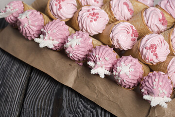 Zephyr in waffle cones. Decorated with decorative sprinkles and mastic snowflakes.