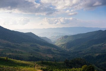 Fototapeta na wymiar Landscape of Mountains ans Valley Under Blue Sky