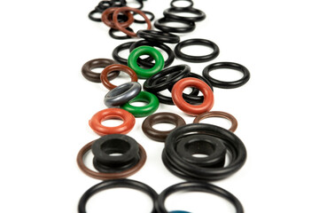 hydraulic and pneumatic sealing rings in different sizes and colors, on a white background. Sealing...