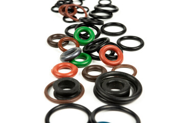 hydraulic and pneumatic sealing rings in different sizes and colors, on a white background. Sealing...