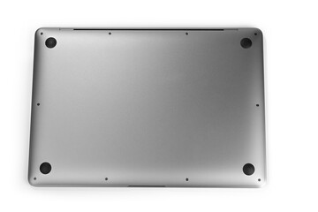 Bottom of a slim laptop on a white background