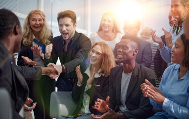 young business people shaking hands with each other.