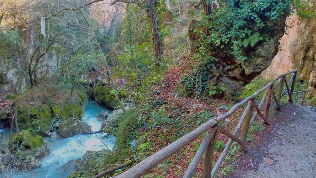 crystal clear stream running through a pristine valley in the town of Pioraco in the Marche region, Italy