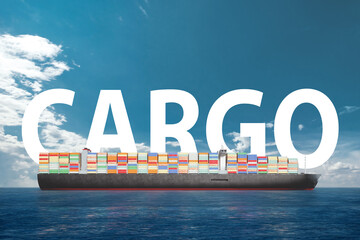 The inscription cargo on the background of a ship with containers in the sea. Freight transport in...