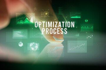 Finger touching tablet with business graphs and icons concept