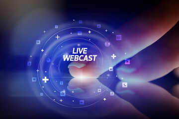 Finger touching tablet with social media icons concept