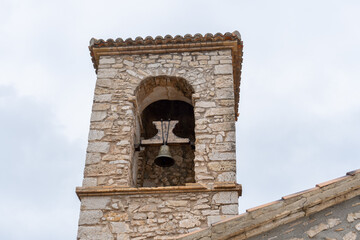 Obraz premium Bell tower of the hermitage of Sant Esteve (S.XVII, Ontinyent Valencia, Spain), built with stone.
