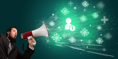 Young person with megaphone and social networking icon