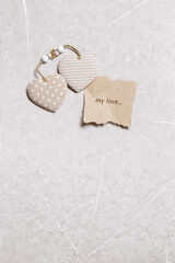 Valentines day concept. Soft toy hearts from linen cloth with gold color striped or dots Valentine as torn paper craft with text my love Paper mock up for text love message