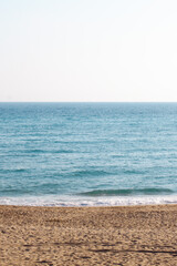 Fototapeta na wymiar beach, sea and sky symmetrically spread