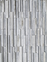 Luxury multi layer brick vertical line square shape gray color. strong brickwork wall outdoor house rock.
