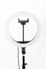 LED ring lamp on a white background. Close-up.