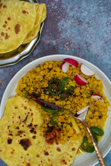 Indian vegan lentil and flat bread bowl