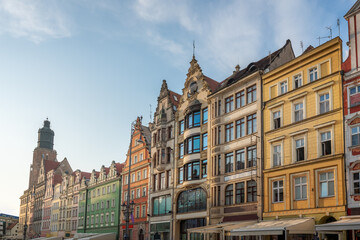 Fototapeta na wymiar Market Square colorful buildings and St Elizabeth Church Tower - Wroclaw, Poland
